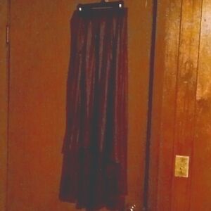 A burgundy high low leather skirt